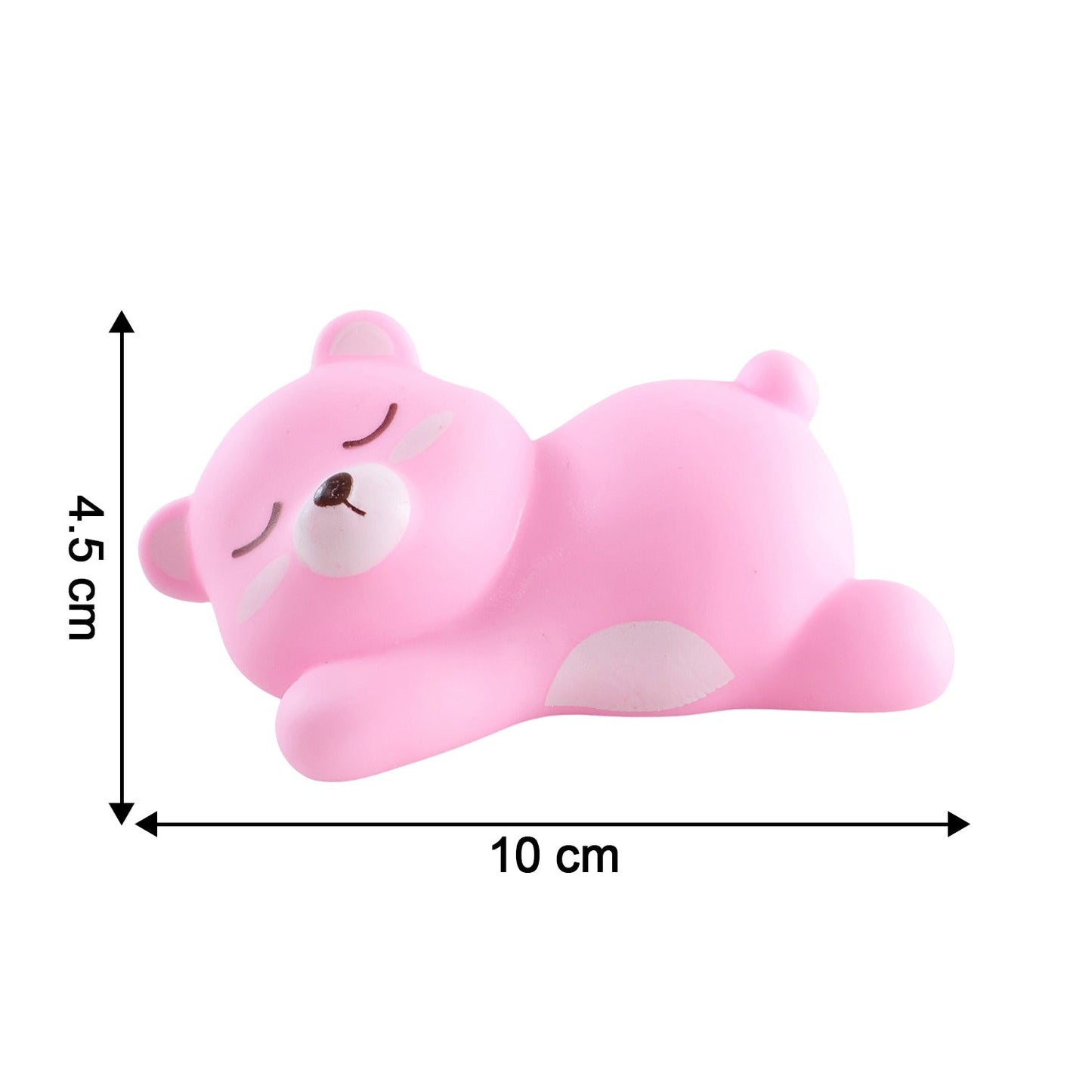 Portable sleeping bear night light held in hand demonstrating its compact size.